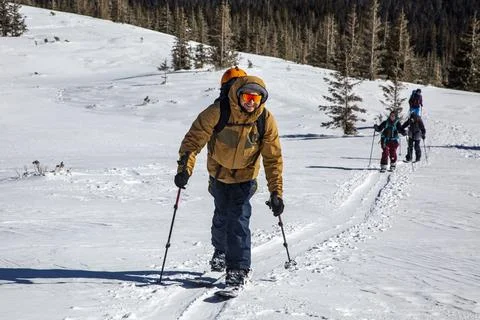 Splitboarding allows snowboarders to access remote backcountry terrain, whe.. Stock Photos