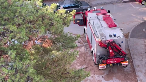 Split,Croatia-08-07-2025: Fire truck arriving after hurricane devastation Stock Footage 312744709