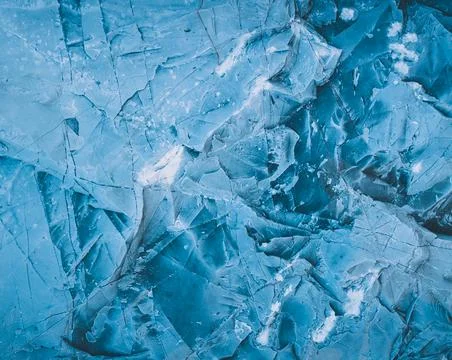 Splits in ice. Cool background. Ice cracks. Rock texture. Ice texture. Rough  Stock Photos