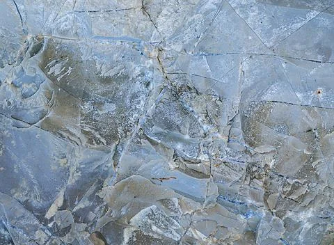 Splits in ice. Cool background. Ice cracks. Rock texture. Ice texture. Rough  Stock Photos