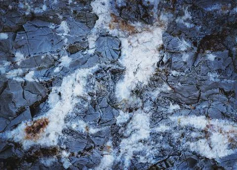 Splits in ice. Cool background. Ice cracks. Rock texture. Ice texture. Rough  Stock Photos