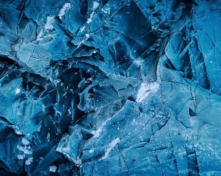 Splits in ice. Cool background. Ice cracks. Rock texture. Ice texture. Rough  Stock Photos