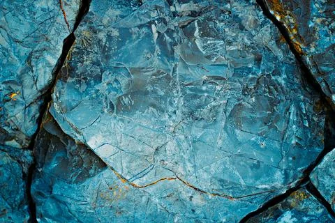 Splits in ice. Cool background. Ice cracks. Rock texture. Ice texture. Rough  Stock Photos