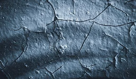 Splits in ice. Cool background. Ice cracks. Rock texture. Ice texture. Rough  Stock Photos