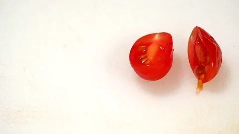 Splitting Cherry Tomato 1 Stock Footage 82847797