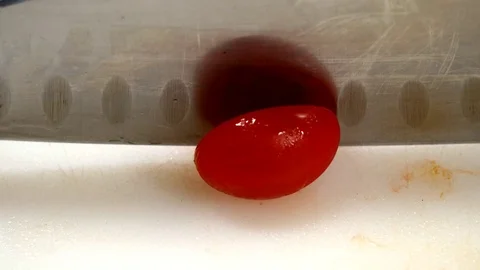 Splitting Cherry Tomato 2 Stock Footage 82847166