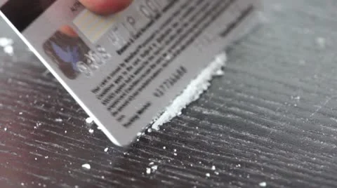 Splitting crystal meth HD Stock Footage 8993583