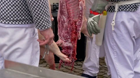 Splitting dead pig in half Stock-Footage 86189352