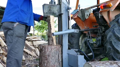 Splitting firewoods with log splitter Stock-Footage 63126504