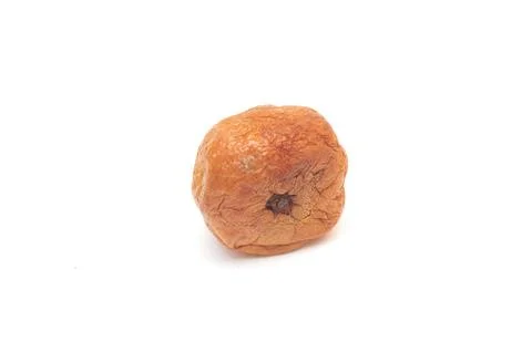 A spoiled soft tangerine isolated on white background. Stock Photos