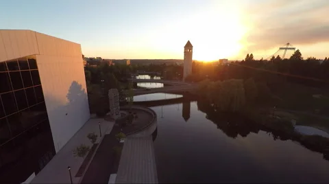 Spokane River Clock Tower Aerial at Sunset Stock Footage 56351182
