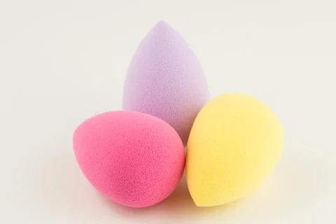 Sponge for applying cosmetics on face Stock Photos