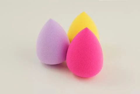 Sponge for applying cosmetics on face Stock Photos