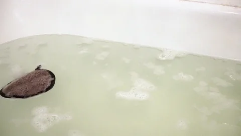 Sponge in bath with foam. 16 Stock Footage 98251463