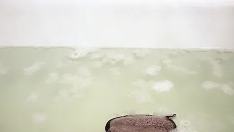 Sponge in bath with foam. 18 Stock Footage 98251436