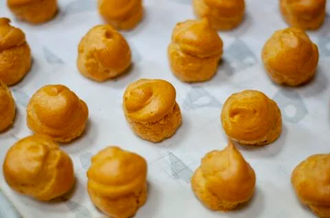 Sponge cake on the baking sheet Stock Photos