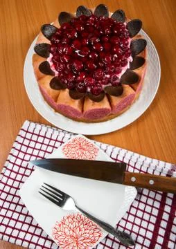 Sponge cake with berries close-up on table stil-life Stock Photos