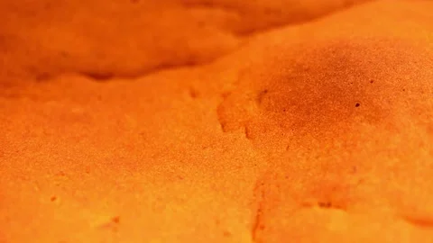 Sponge cake in a black frying pan is rotated in a circle on the table. Stock Footage 142326787