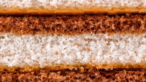Sponge cake, dark and light layers, view on side, moving sideways Stock Footage 245518986