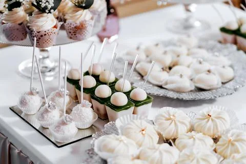 Sponge cake with matcha and raspberry filling topped with sour cream. Square  Stock Photos