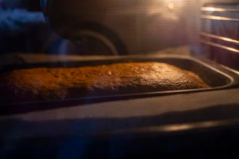 Sponge cake in the oven Stock Photos