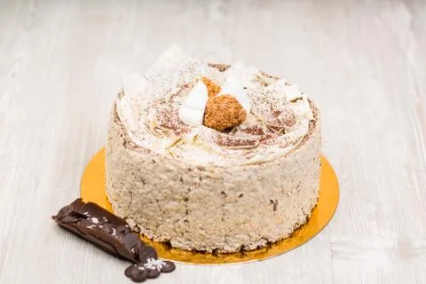 The sponge chocolate cake on the table Stock Photos