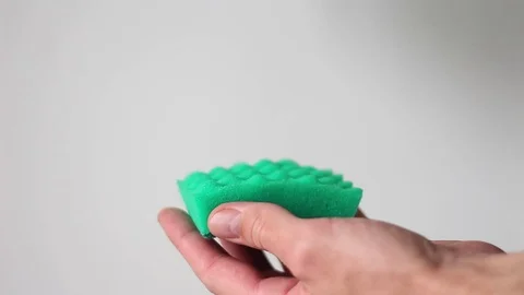 Sponge with detergent in man's hands Stock Footage 70943414