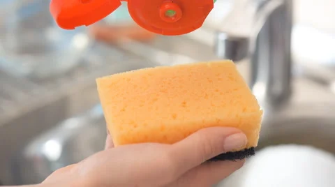 Sponge with dish washing liquid. Stock Footage 60621605