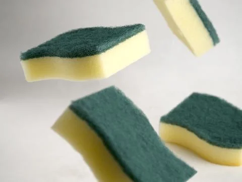 Sponge dish washing Stock Photos