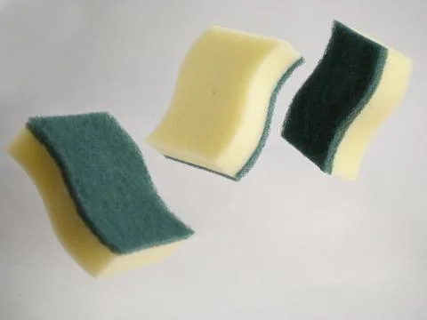 Sponge dish washing Stock Photos