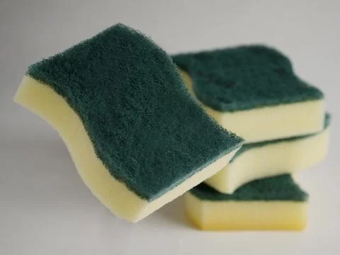 Sponge dish washing Stock Photos