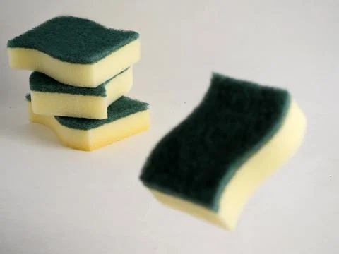 Sponge dish washing Stock Photos