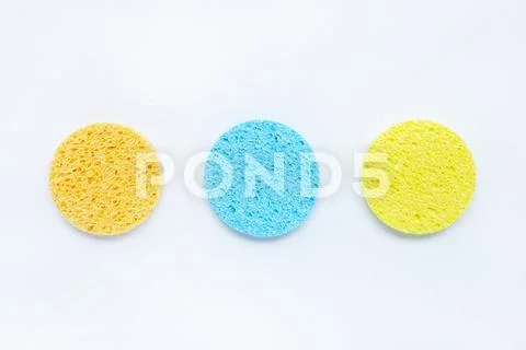 Sponge for face make-up cleaning on white. Stock Photos