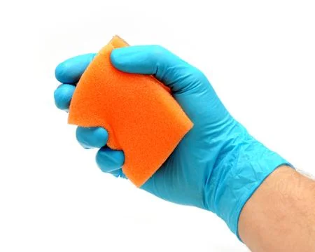 Sponge in hand Stock Photos