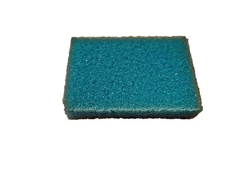 Sponge isolated on white background Photos