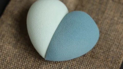 Sponge for makeup. The makeup sponge rotates. sponge for cosmetics Stock Footage 129481342