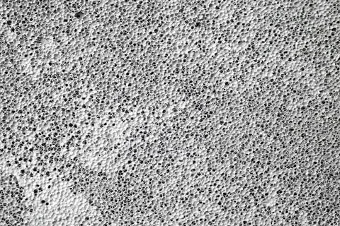 Sponge texture with gray cement paint Stock Photos