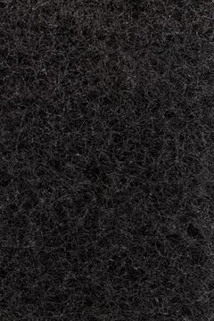 Sponge textured background. Black. Close up. Stock Photos