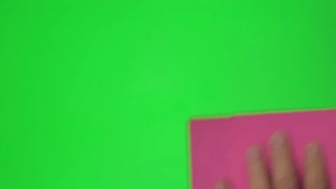 Sponge to wipe mud on a green background. Hygiene concept. Stock Footage 221863353