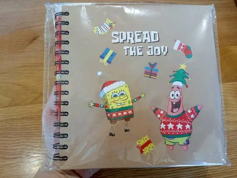 SpongeBob &amp; Patrick Christmas Notebook - Spread the Joy Stock Photos