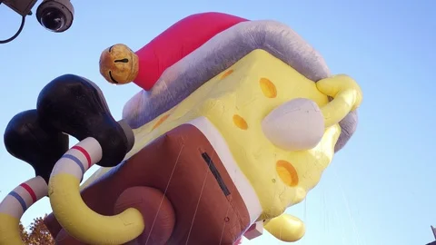 Spongebob Squarepants going down streets of NYC 4k Stock Footage 87707039
