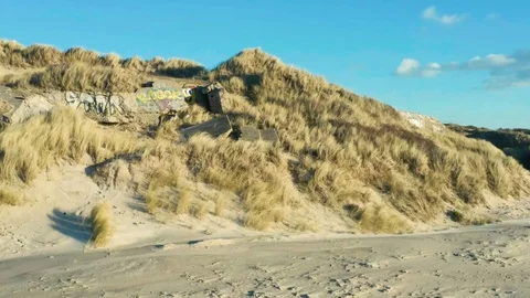 SpongeBob tagged on a blockhouse - Berck Beach (France) Stock Footage 101597961