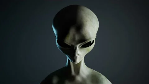 Spooky alien's face on black background. UFO and extraterrestrial life concept. Stock Footage
