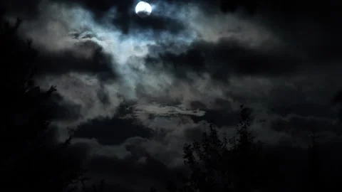 Spooky blue full moon with clouds time lapse 30fps Stock Footage 162783255