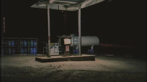 Spooky Empty Gas Station Nighttime Old VHS Texture Tracking Shot Stock Footage 263209472