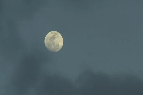 Spooky Full Moon behind black clouds 3 Stock Footage 702484