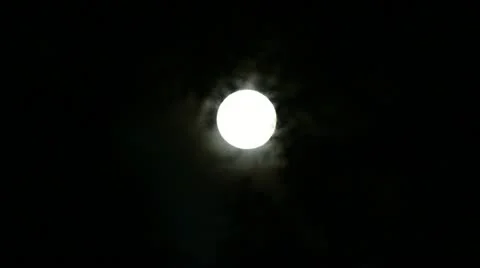 Spooky Full Moon Timelapse - Bright Moon Moving Through Dark Clouds Stock Footage 11448337