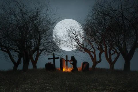 Spooky graveyard with full moon background Stock Photos