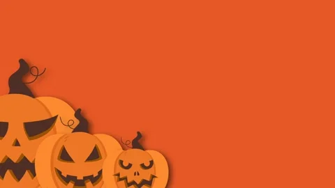 Spooky Halloween background with carved jack o lantern pumpkins on vibrant .. Stock Footage 344951202