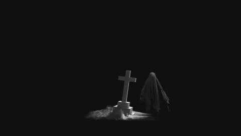 Spooky Halloween ghost beside a graveyard cross tombstone with eerie smoke. Stock Footage 318206757